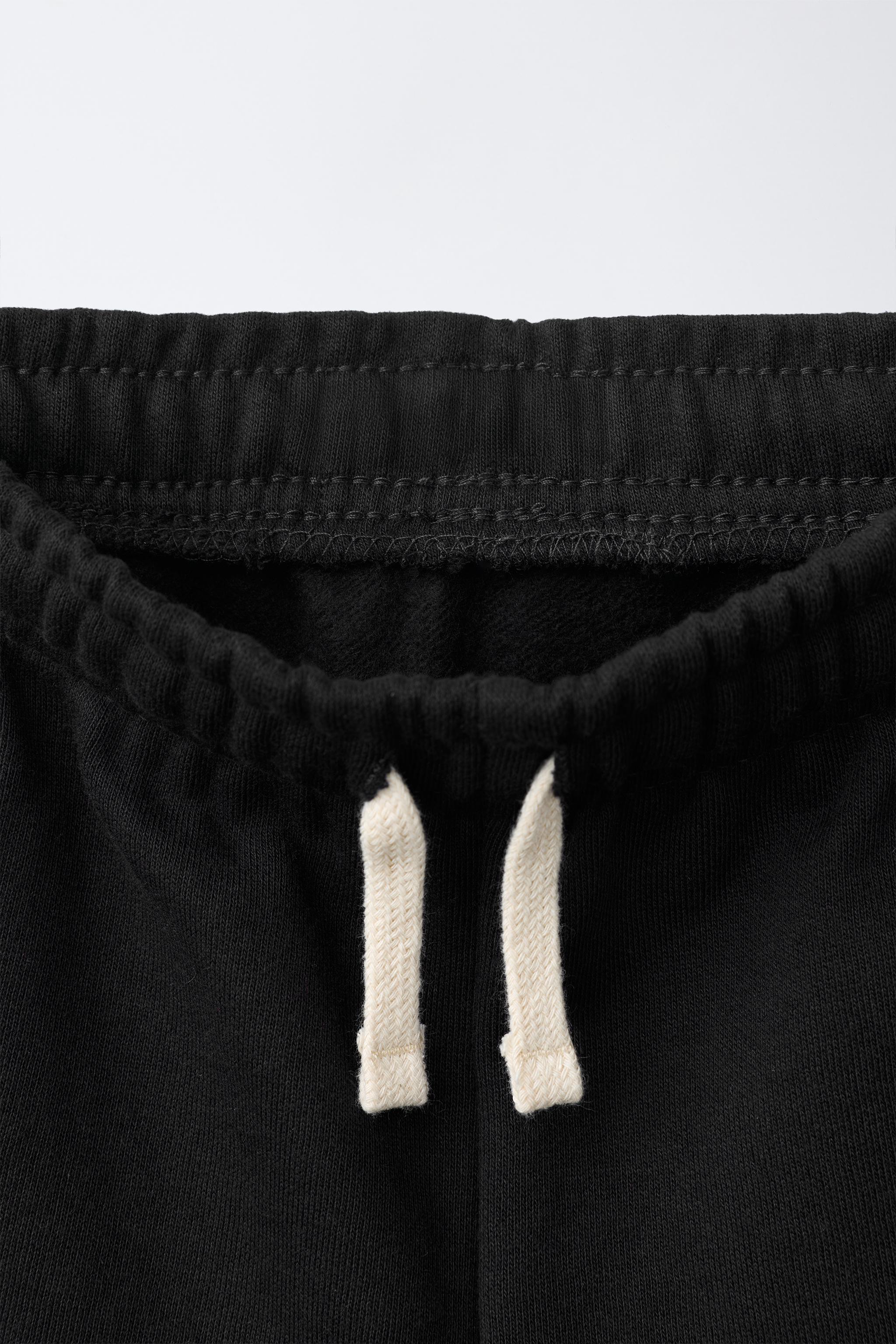 SOLID FLEECE JOGGERS WITH LABEL